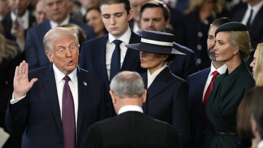 WASHINGTON, DC – JANUARY 20:  Donald Trump is sworn as U.S. president by Supreme Court Chief Justice John Roberts as Melania Trump holds the Bible  in the U.S. Capitol Rotunda on January 20, 2025 in Washington, DC. Donald Trump takes office for his second term as the 47th president of the United States. (Photo by Julia Demaree Nikhinson – Pool/Getty Images)