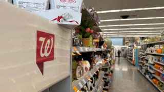 The Walgreens logo is displayed at a Walgreens store on October 15, 2024 in San Rafael, California.