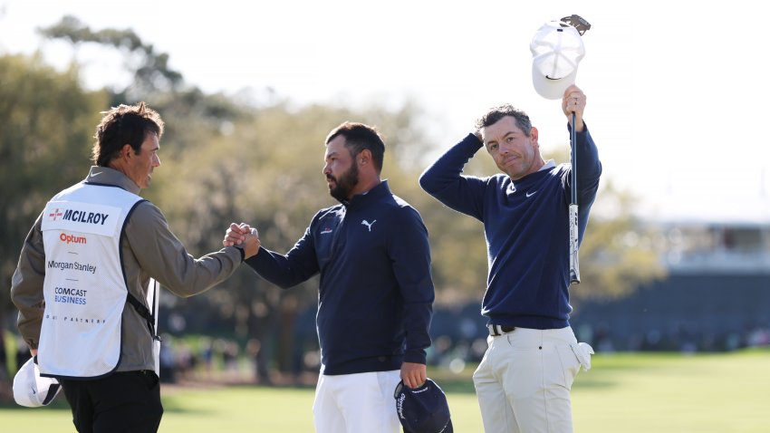 Rory McIlroy and J.J. Spaun