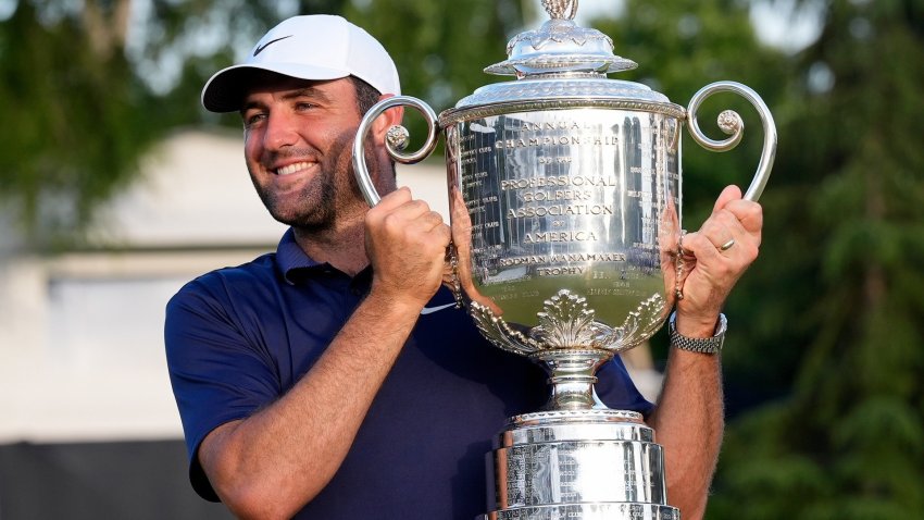 Scottie Scheffler wins PGA Championship. Holding trophy
